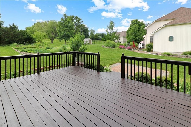 1503 Nottingham Dr, Warrensburg, MO 64093 - deck with a yard and a storage unit