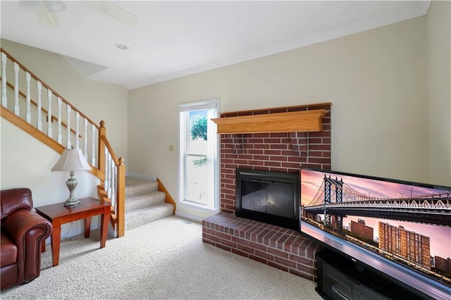 1503 Nottingham Dr, Warrensburg, MO 64093 - living area with carpet, stairs, a fireplace, and ornamental molding