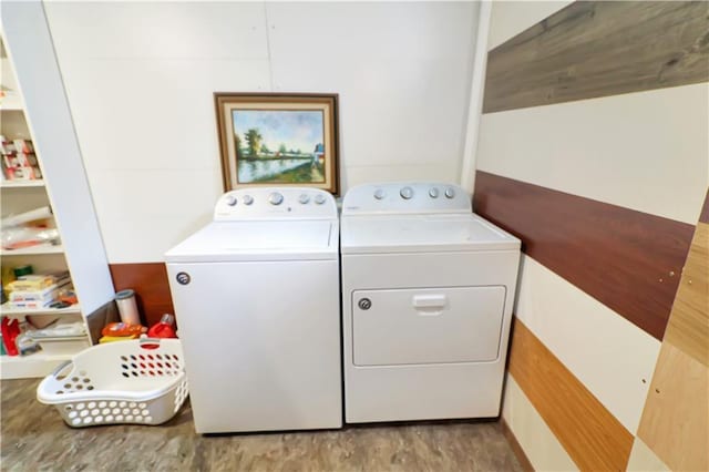 1503 Nottingham Dr, Warrensburg, MO 64093 - laundry area featuring washing machine and dryer and wood finished floors