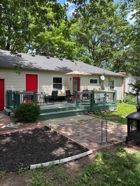 9105 W 95th Ter, Overland Park, KS 66212 - back of house with a deck and a patio area