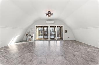 4901 E 215th St, Belton, MO 64012 - bonus room with lofted ceiling and a wall mounted air conditioner