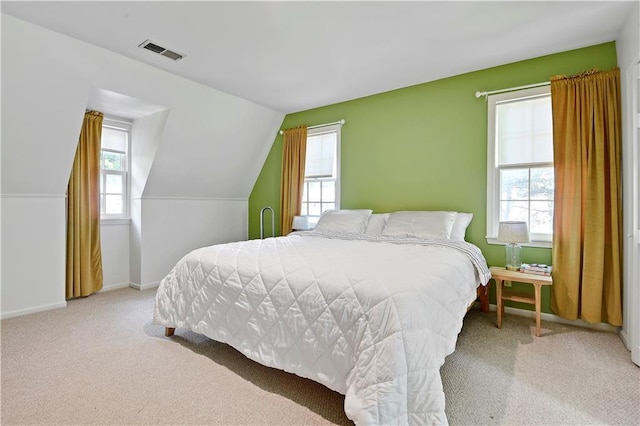 4912 W 69th St, Prairie Village, KS 66208 - bedroom featuring multiple windows, carpet, and vaulted ceiling