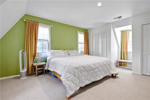 4912 W 69th St, Prairie Village, KS 66208 - carpeted bedroom with multiple windows and lofted ceiling
