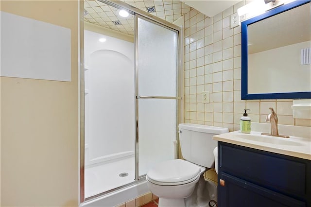 4912 W 69th St, Prairie Village, KS 66208 - full bath featuring tile walls, a stall shower, vanity, and backsplash