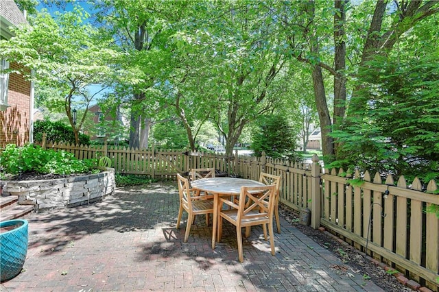4912 W 69th St, Prairie Village, KS 66208 - fenced backyard with a patio area and outdoor dining area