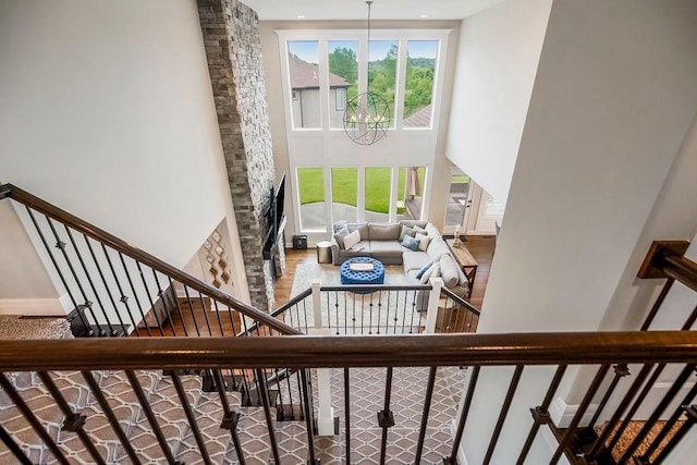 15801 Canterbury St, Overland Park, KS 66224 - stairway with a towering ceiling and a chandelier
