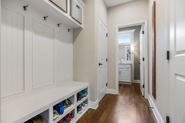 15801 Canterbury St, Overland Park, KS 66224 - mudroom with dark wood-style floors and baseboards
