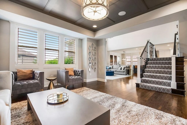 15801 Canterbury St, Overland Park, KS 66224 - living area featuring dark wood-type flooring, stairs, and recessed lighting