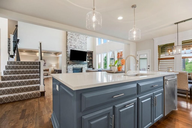 15801 Canterbury St, Overland Park, KS 66224 - kitchen with stainless steel dishwasher, plenty of natural light, and dark wood-style floors