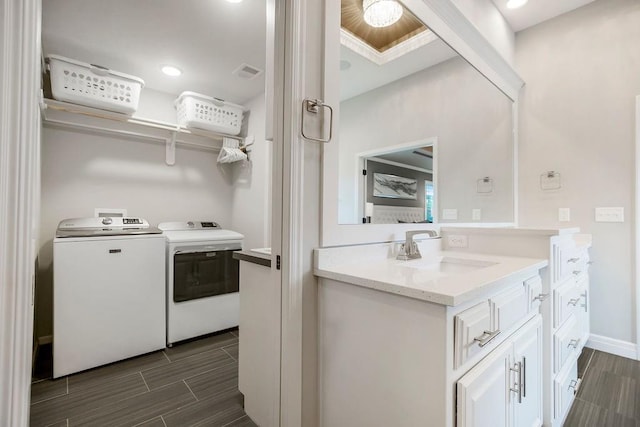 15801 Canterbury St, Overland Park, KS 66224 - laundry room featuring independent washer and dryer and wood finish floors
