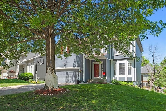 22116 W 51st St, Shawnee, KS 66226 - view of property hidden behind natural elements with concrete driveway and a front yard