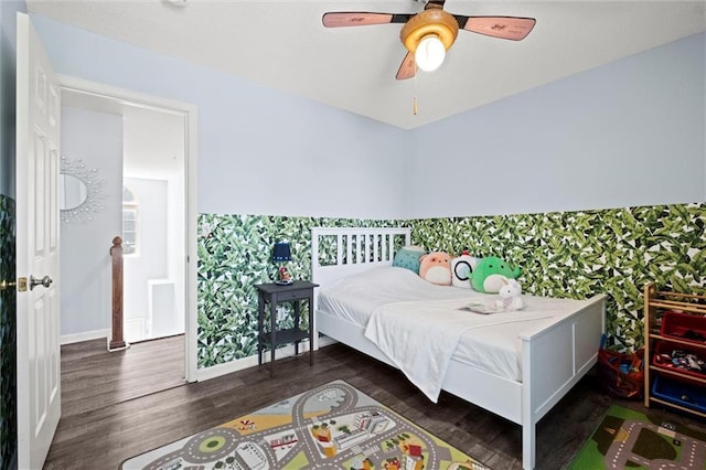 22116 W 51st St, Shawnee, KS 66226 - bedroom with wood finished floors, wallpapered walls, and a ceiling fan