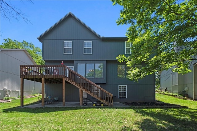 22116 W 51st St, Shawnee, KS 66226 - back of house with stairs, a wooden deck, a patio, and a yard