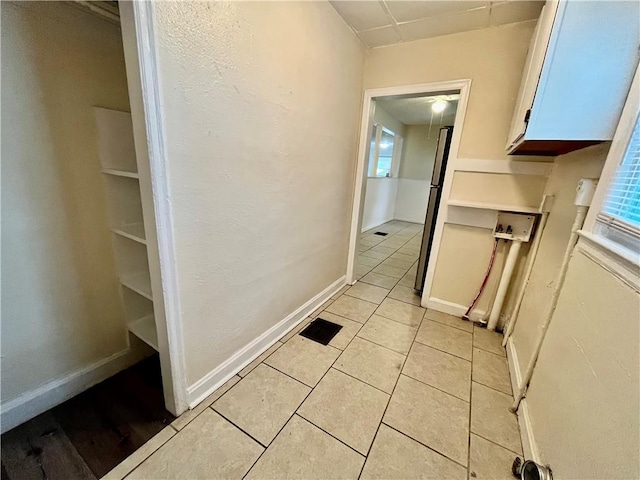 551 S Brookside Ave, Independence, MO 64053 - hall featuring light tile patterned floors and baseboards