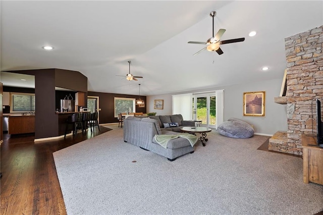 4813 NW Northwood Rd, Riverside, MO 64150 - carpeted living room featuring ceiling fan, lofted ceiling, and wood finished floors
