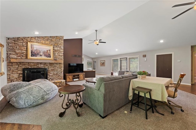 4813 NW Northwood Rd, Riverside, MO 64150 - living room featuring ceiling fan, vaulted ceiling, a fireplace, wood finished floors, and recessed lighting