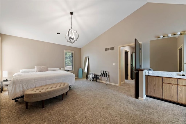 4813 NW Northwood Rd, Riverside, MO 64150 - bedroom with light colored carpet, a chandelier, and high vaulted ceiling