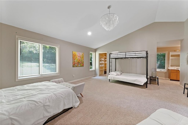 4813 NW Northwood Rd, Riverside, MO 64150 - bedroom featuring lofted ceiling, carpet flooring, a chandelier, and connected bathroom