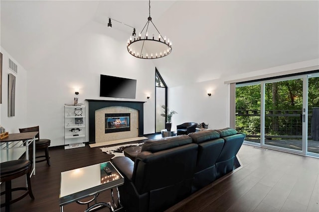 4813 NW Northwood Rd, Riverside, MO 64150 - living room featuring high vaulted ceiling, a chandelier, wood finished floors, and a high end fireplace