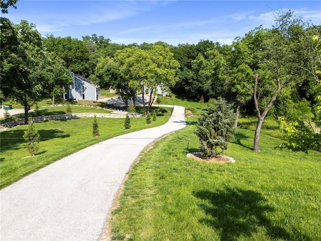 4813 NW Northwood Rd, Riverside, MO 64150 - surrounding community with a yard