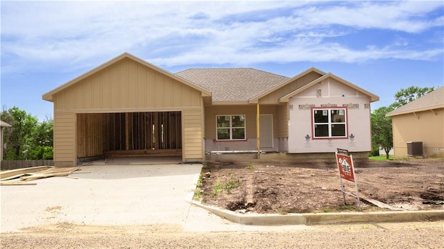 1105 Charles St, Knob Noster, MO 65336 - property under construction with an attached garage and driveway