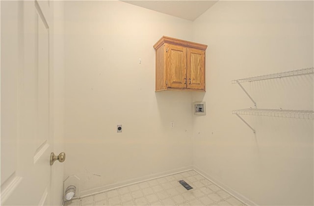 6306 W 128th St, Overland Park, KS 66209 - washroom with cabinet space, hookup for a washing machine, electric dryer hookup, and light flooring