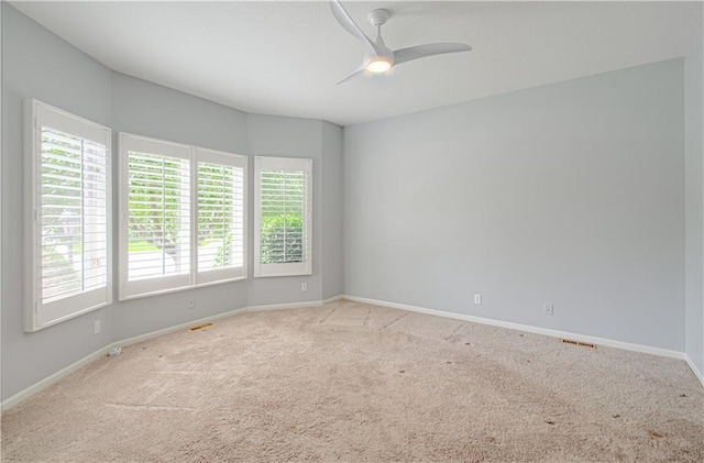 6306 W 128th St, Overland Park, KS 66209 - carpeted spare room featuring a ceiling fan and baseboards