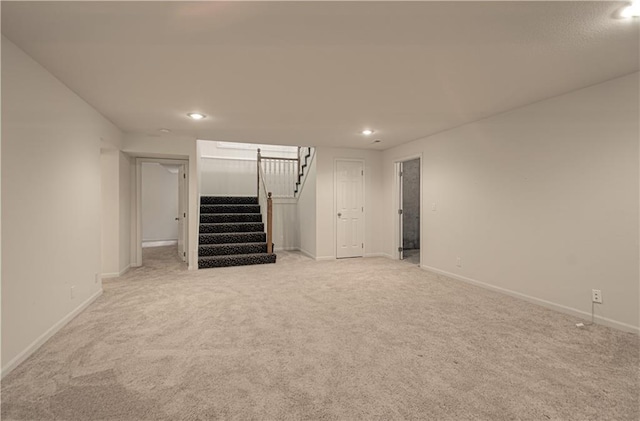 6306 W 128th St, Overland Park, KS 66209 - finished below grade area with stairs, light carpet, and recessed lighting