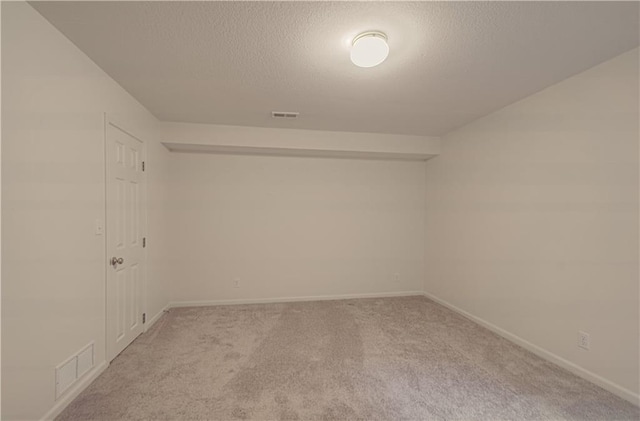 6306 W 128th St, Overland Park, KS 66209 - carpeted spare room featuring a textured ceiling and baseboards