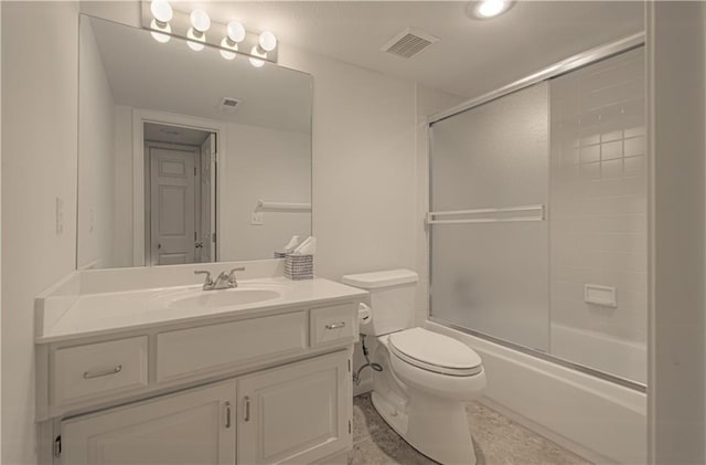 6306 W 128th St, Overland Park, KS 66209 - full bathroom featuring vanity, combined bath / shower with glass door, and tile patterned floors