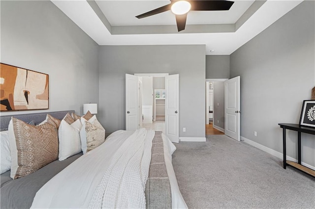15837 El Monte St, Overland Park, KS 66224 - carpeted bedroom with a raised ceiling and ceiling fan