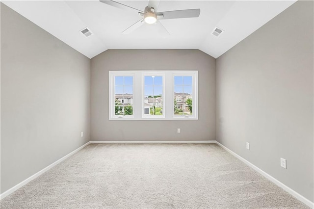15837 El Monte St, Overland Park, KS 66224 - spare room with a ceiling fan, light carpet, and lofted ceiling