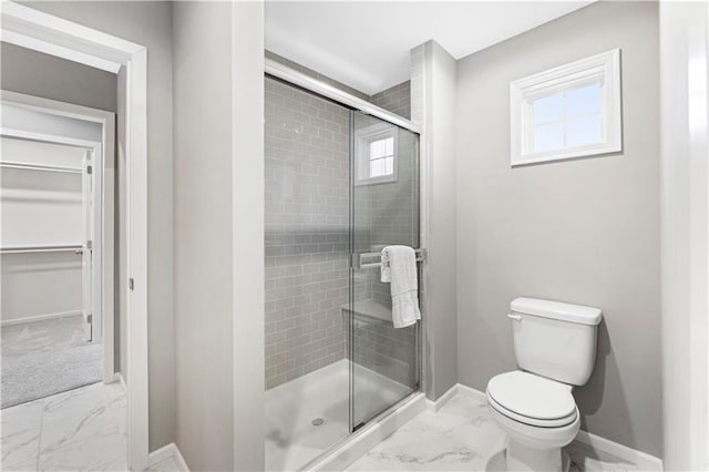 15837 El Monte St, Overland Park, KS 66224 - full bath with marble look tiles, a shower stall, and a walk in closet