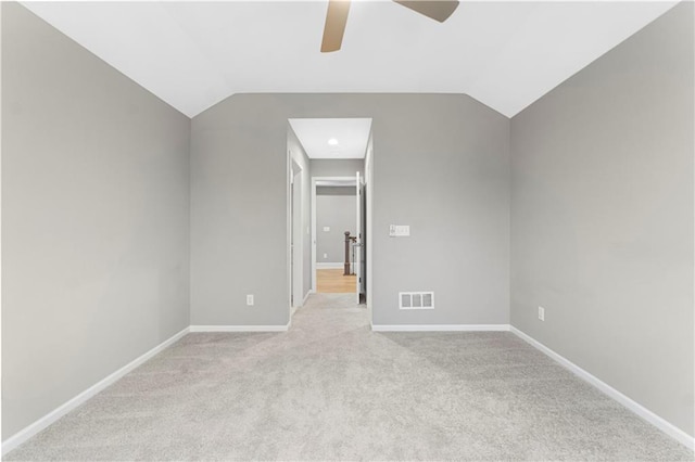 15837 El Monte St, Overland Park, KS 66224 - spare room with ceiling fan, light colored carpet, and vaulted ceiling