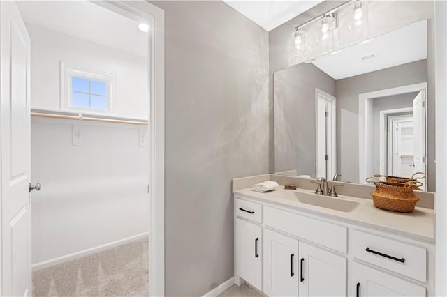 15837 El Monte St, Overland Park, KS 66224 - bathroom featuring vanity and baseboards
