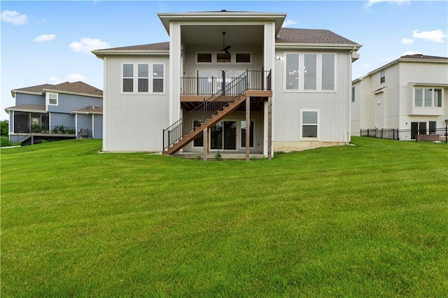 15837 El Monte St, Overland Park, KS 66224 - rear view of house featuring stairs, a yard, ceiling fan, a wooden deck, and a shingled roof