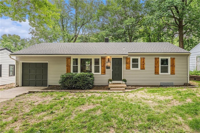 9023 E 74th Ter, Raytown, MO 64133 - single story home featuring a garage, concrete driveway, and a front yard