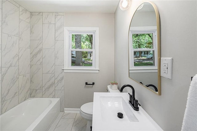 9023 E 74th Ter, Raytown, MO 64133 - bathroom with healthy amount of natural light, marble finish floors, and  shower combination