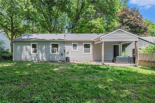9023 E 74th Ter, Raytown, MO 64133 - rear view of house with a patio area and an outdoor hangout area