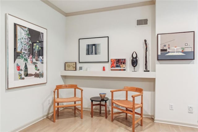 433 Ward Pkwy Unit 1S, Kansas City, MO 64112 - living area with crown molding and wood finished floors