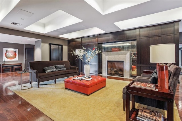 433 Ward Pkwy Unit 1S, Kansas City, MO 64112 - living room with a skylight, a high end fireplace, and wood finished floors