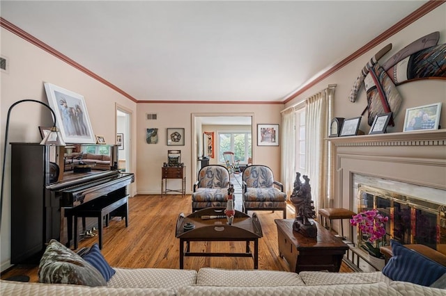 6451 Sagamore Rd, Mission Hills, KS 66208 - living area featuring wood finished floors, crown molding, and a premium fireplace