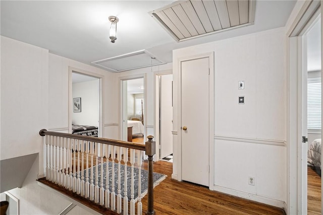 6451 Sagamore Rd, Mission Hills, KS 66208 - hallway with attic access and wood finished floors