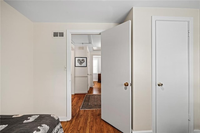 6451 Sagamore Rd, Mission Hills, KS 66208 - bedroom with wood finished floors and attic access