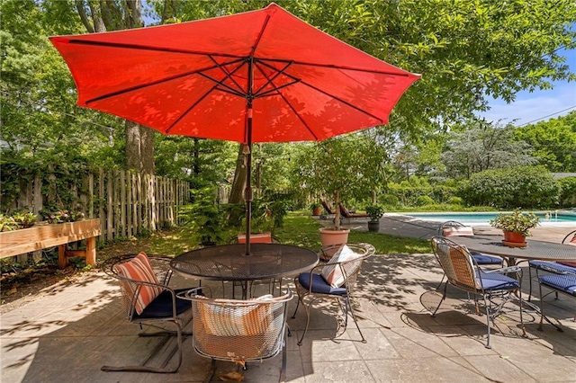 6451 Sagamore Rd, Mission Hills, KS 66208 - view of patio with outdoor dining area and an outdoor pool
