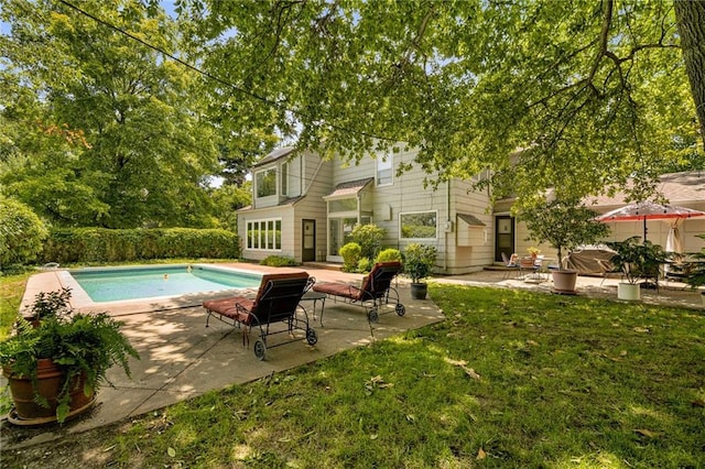6451 Sagamore Rd, Mission Hills, KS 66208 - view of pool with a patio and a lawn