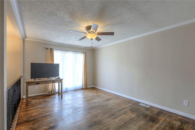 16100 E Elm St, Independence, MO 64050 - unfurnished living room with wood finished floors, a textured ceiling, a ceiling fan, and ornamental molding