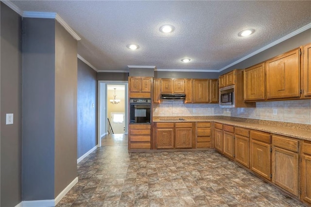 16100 E Elm St, Independence, MO 64050 - kitchen with black appliances, under cabinet range hood, brown cabinets, crown molding, and a textured ceiling