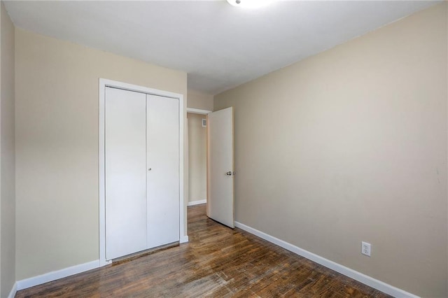 16100 E Elm St, Independence, MO 64050 - unfurnished bedroom with wood finished floors and a closet