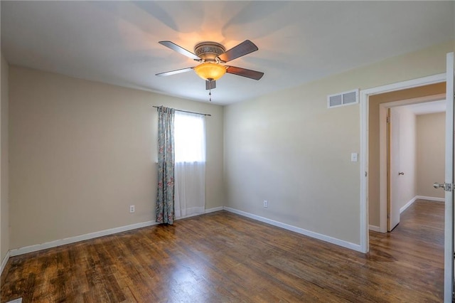 16100 E Elm St, Independence, MO 64050 - spare room with ceiling fan and dark wood finished floors
